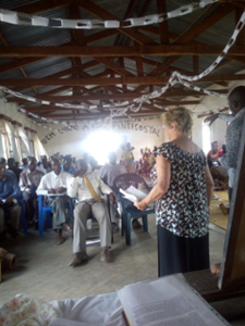 Marie talking to Community Leaders